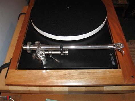 A brand new, low mass, precision engineered, vertical bearing assembly has been manufactured to further complement the inherent design philosophy of the RP10 turntable. . Used rega tonearm